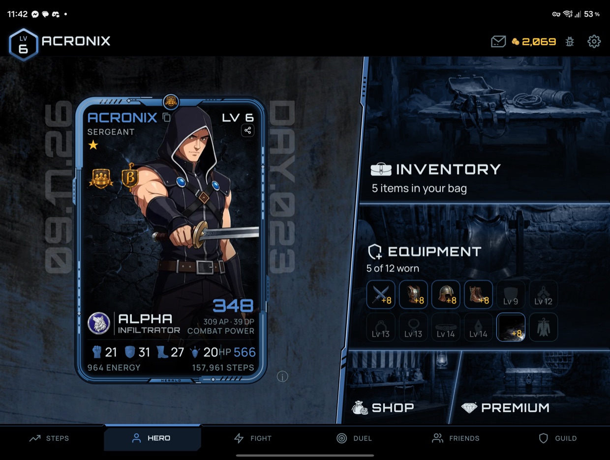 The hero tab on the inner display, the card beside the equipment grid